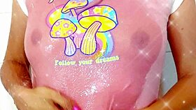 The big ass stepsister bathes in the shower wearing panties and thong.