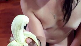 Cheap Whore Boldly Eats Cum Covered Banana in Homemade Scene