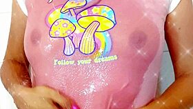 The big ass stepsister bathes in the shower wearing panties and thong.