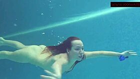 Lina Mercury enjoys a relaxing underwater bath in the shower.