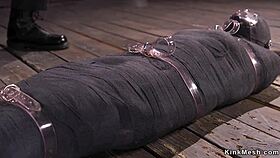 mimmified brunette endures harsh whipping session