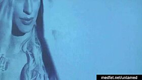 Female and male strippers perform undressing and dancing to tease the audience