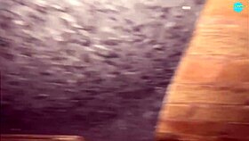 Watch this mature street whore shoving items into her shaved pussy on the run