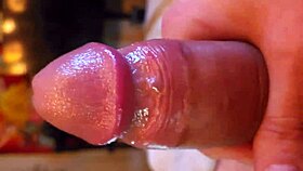 Tall nerd plays with his shaved cock