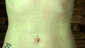 petite brunette in hogtie suspension bondage