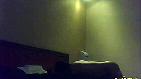 a woman from cuernavaca checks into a hotel room