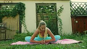 sexy yoga session in blue leggings on a green meadow 😍