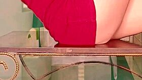 Wife rubbing shaved pussy solo in amateur video.