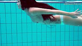 Hot Tits and Shaved Pussy Glimmer Underwater in Bikini Scene