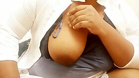 The asian aunty has big boobs and sexy tits.