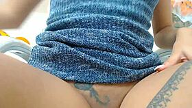 This babe intensely masturbates her awesome shaved pussy at home