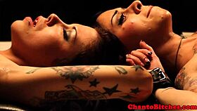 Lezdom mistress ruling over bound submissives