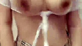 Asian amateur woman masturbates in casual home setting