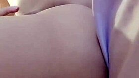 Asian amateur woman masturbates in casual home setting