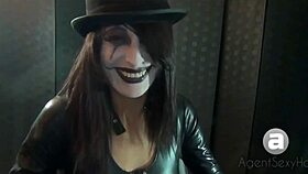 Goth girl shows smoking styles in a fetish setting