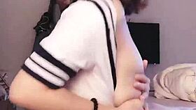 Asian amateur woman masturbates in casual home setting