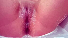 Why is that bitch masturbating her pussy in the bath?
