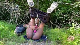 Ebony amateur masturbates in the woods