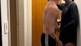 Young guys kissing get caught by the building camera – what a provocative scene!