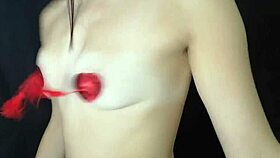 Young Girl Teasing Her Natural Tits With Nipple Stickers