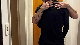 Young guys kissing get caught by the building camera – what a provocative scene!