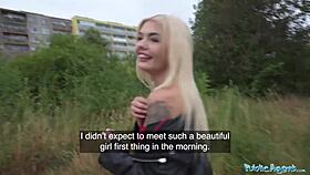 Hey, check out this hot blonde in a sexy red dress sucking dick in public.