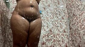 Morena gets filmed in the shower.