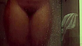 Petite with big tits masturbates alone in the shower