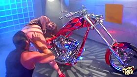 Busty Redheaded Biker Girl Rides Hard