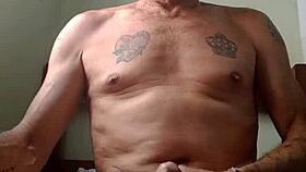 two men engage in intimate sexual activity together