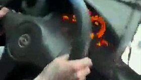 He jerks off his big cock while driving the car solo