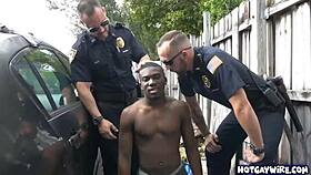 in the office, two police officers take advantage of the black guy