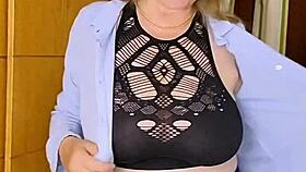 Busty milf Mariaold gives a titty fuck with her big natural tits