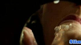 Classy European babe enjoys private moment at wall.