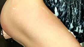 Classy European babe enjoys private moment at wall.