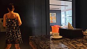 Playing sexy without panties while the host picks up guests