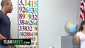 Teenage girl with big tits receives cum in her mouth while getting banged hard by big cocks in the classroom group scene