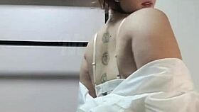 Teasing with sexy white lingerie on big tits