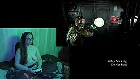 naked brunette plays deadspace part 2 with big natural tits