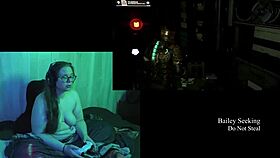 naked brunette plays deadspace part 2 with big natural tits