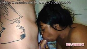 American beauty deepthroats lover's cock in shower, gagging and getting wet