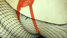 She performs a christmas striptease, ripping clothes and revealing thong