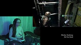 naked brunette plays deadspace part 2 with big natural tits