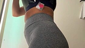 Wife changes clothes in mall fitting room