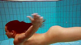 big tits petite babe deniska swims in pool underwater