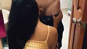 The seller sneaks behind the fitting room and shoves his big cock into the Arab babe's pussy in the clothes store.