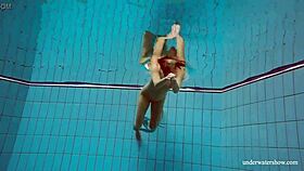 big tits petite babe deniska swims in pool underwater