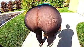 beautiful 43yo housewife spreads in transparent leggings outdoors.