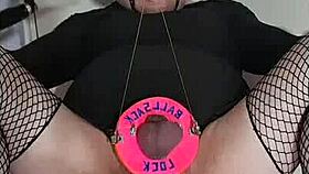 why is this crossdressing sissy doing gay bdsm on himself?
