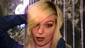 Sexy blonde gamer girl Roxy shows off her boots and legs in slow motion!